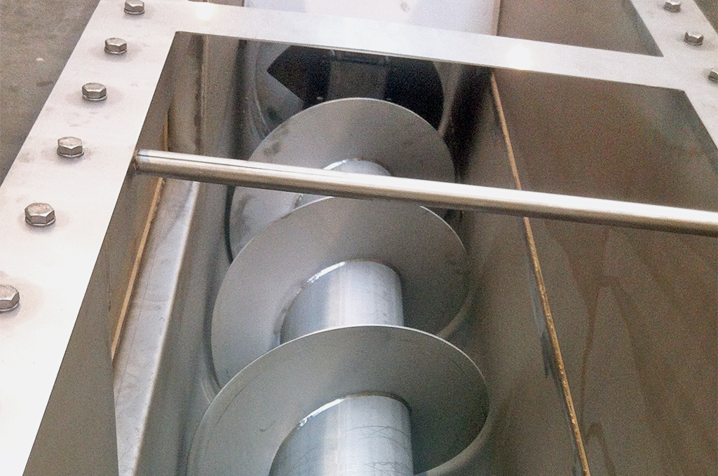 Screw conveyor prilling